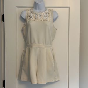 Cream romper shorts with pockets